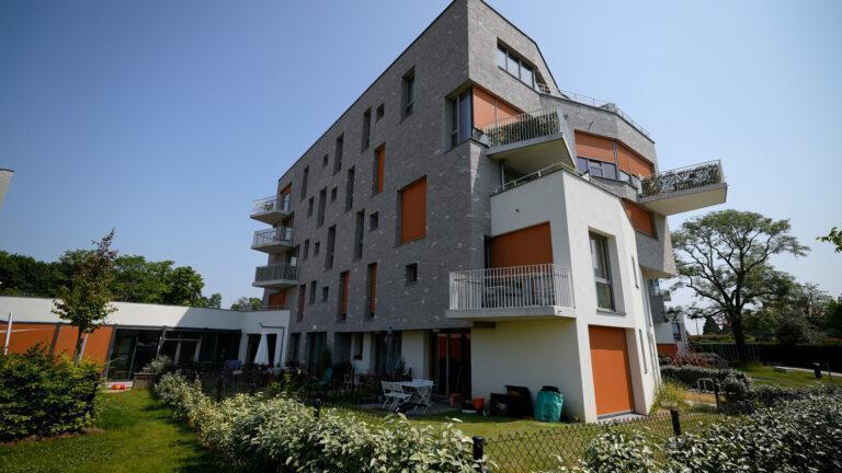 Projet Archiducs à Bruxelles. Placement de châssis bois-aluminium Fabribois